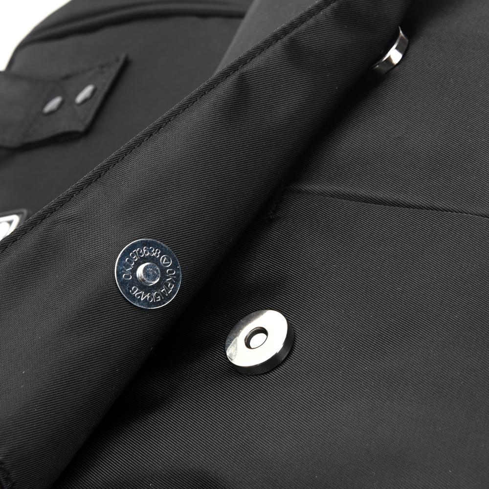 Mochila maternal Skora con cambiador Negra Boca De Pez